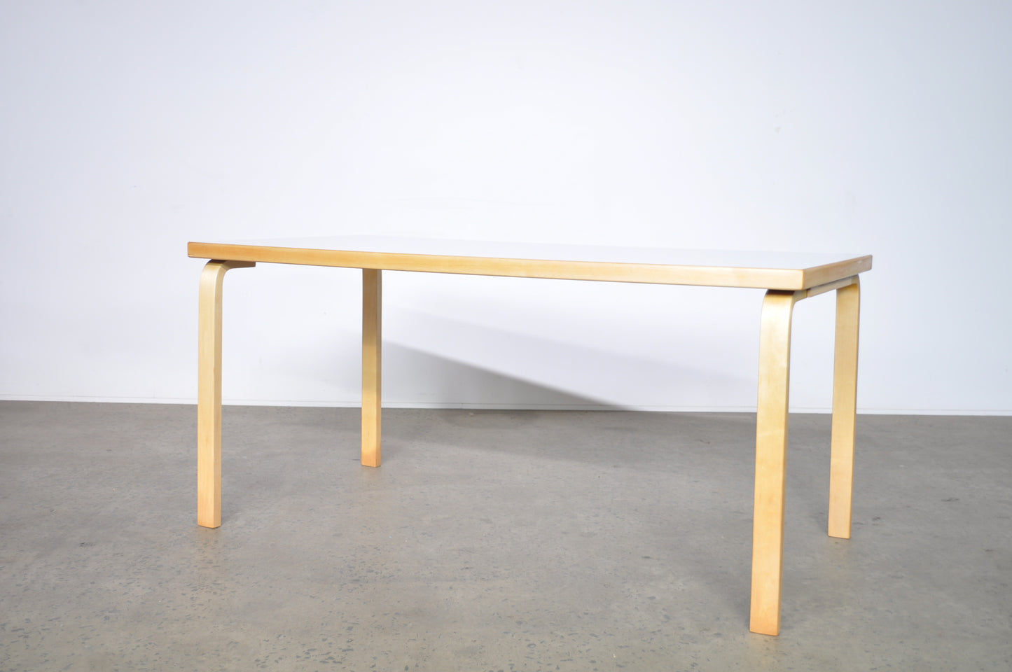 Alvar Aalto dining chairs by Artek in natural. Includes free dining table.