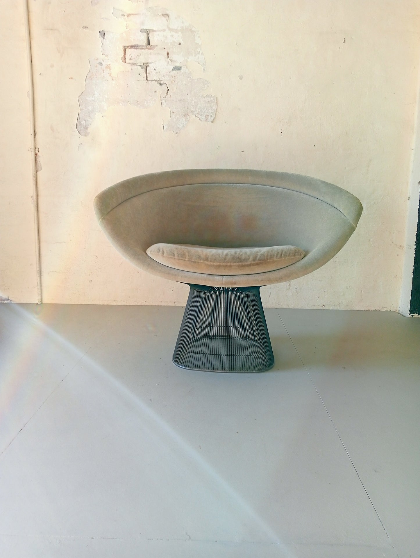 Warren Platner for Knoll armchairs.