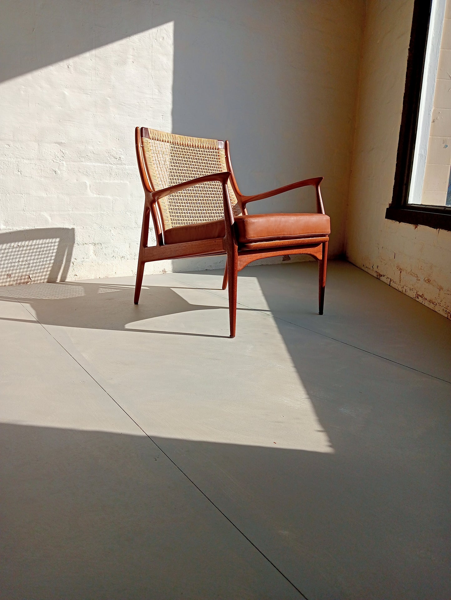 Rattan and teak lounge chair by Erik Andersen & Palle Pedersen for Horsnaes Møbler