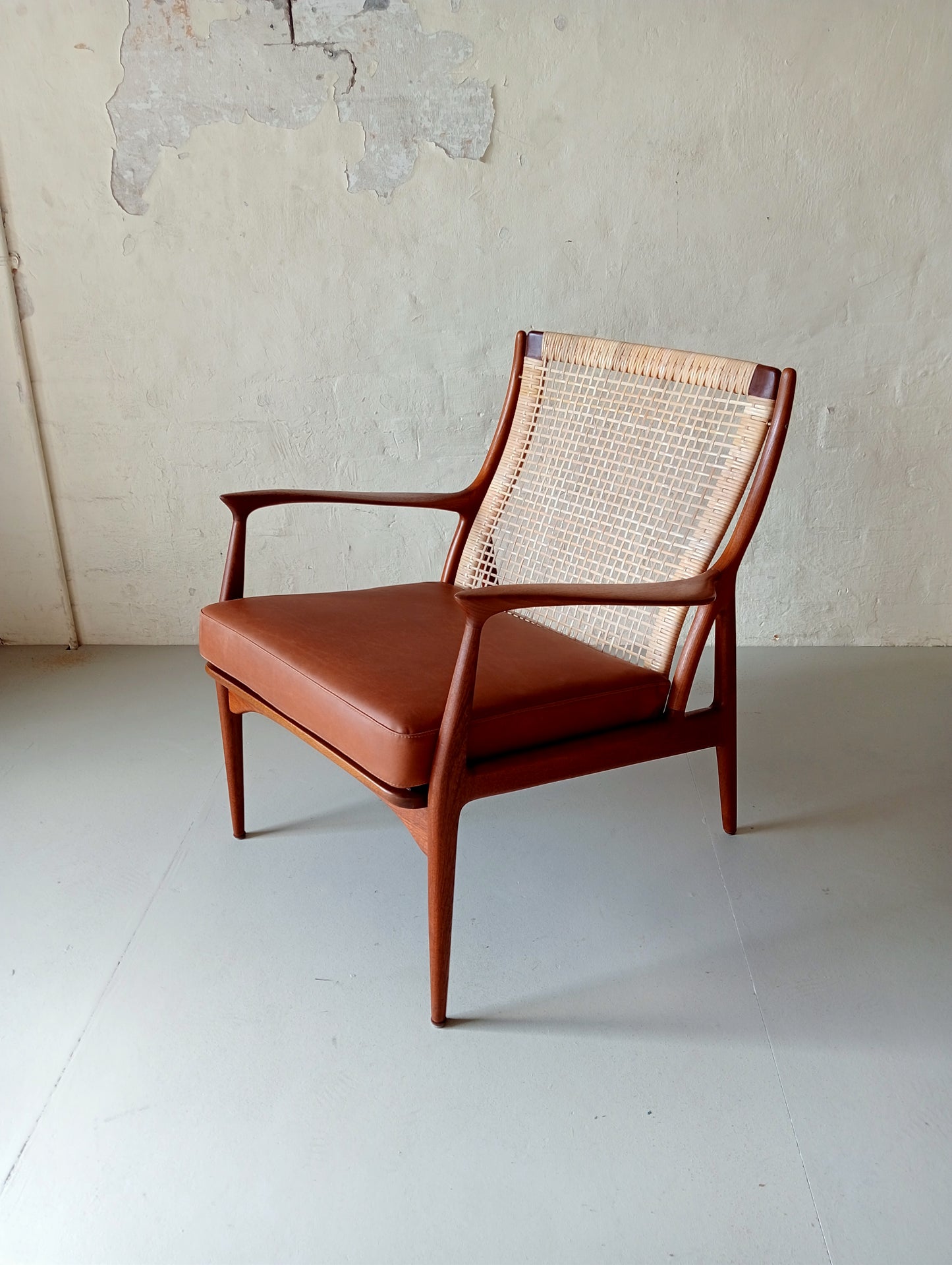 Rattan and teak lounge chair by Erik Andersen & Palle Pedersen for Horsnaes Møbler