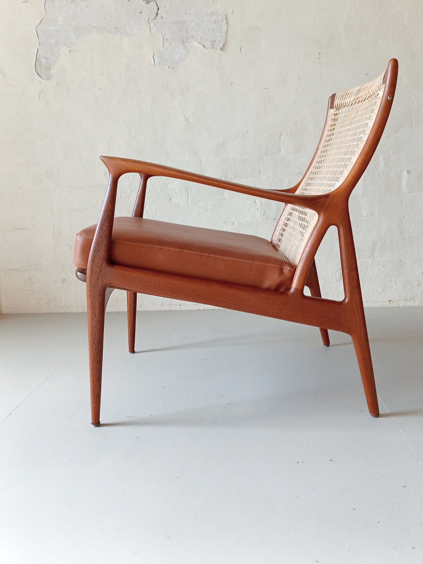 Rattan and teak lounge chair by Erik Andersen & Palle Pedersen for Horsnaes Møbler