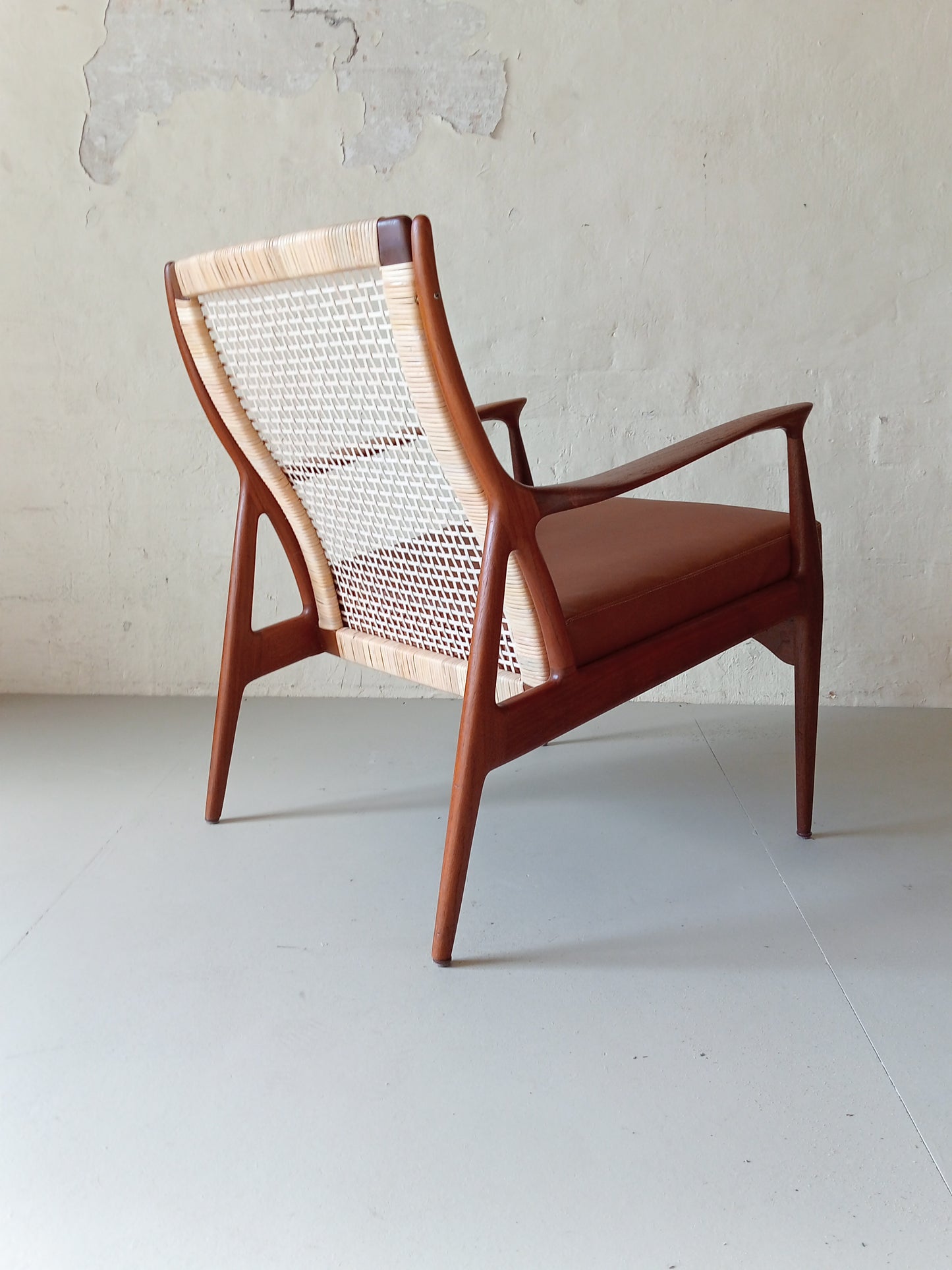 Rattan and teak lounge chair by Erik Andersen & Palle Pedersen for Horsnaes Møbler