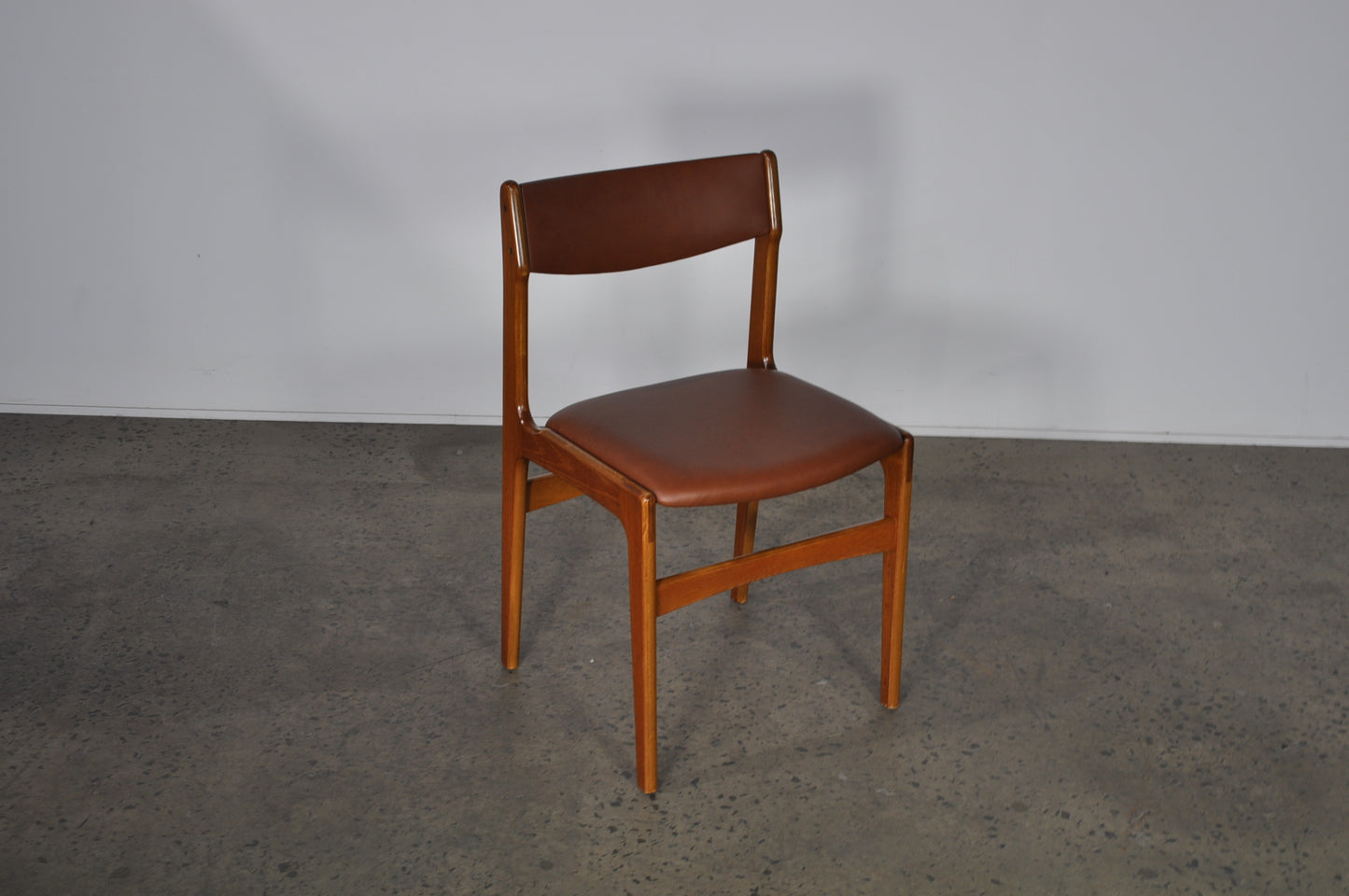 Erik Buch Teak dining chairs.Set of 8 In brown leather.