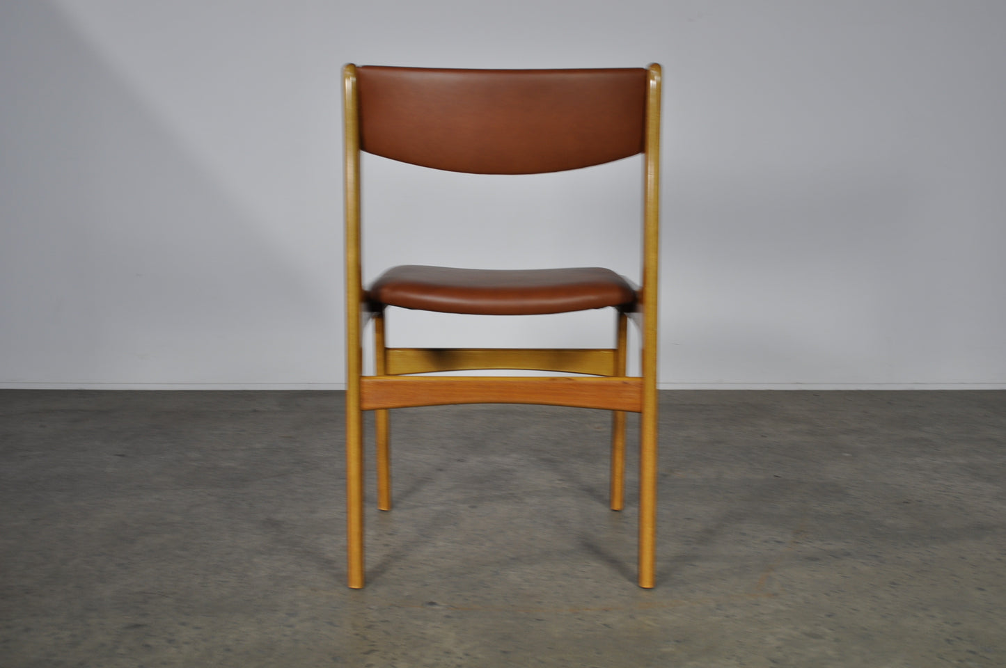 Erik Buch Teak dining chairs.Set of 8 In brown leather.