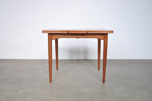 Parker teak extension table.