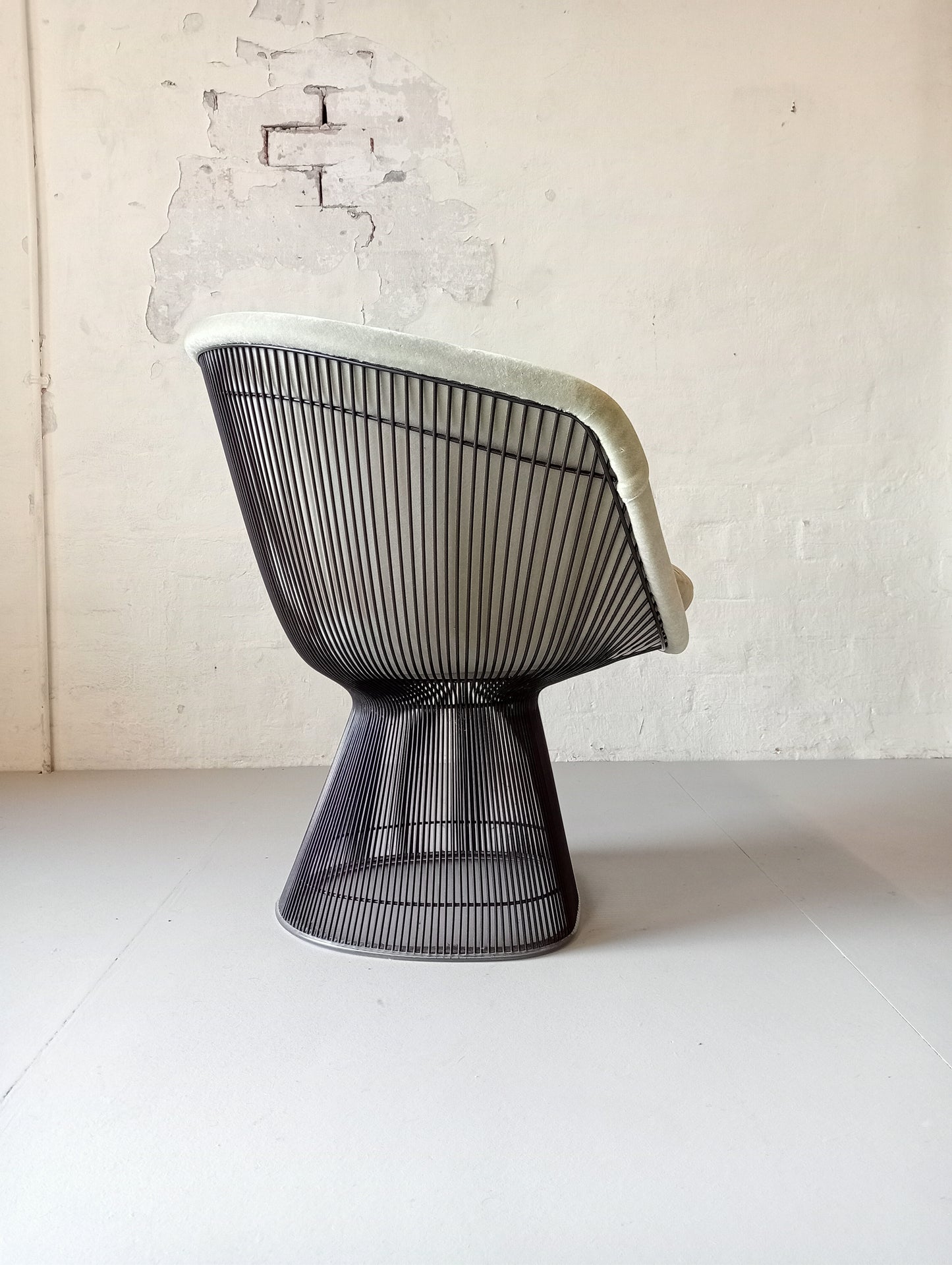 Warren Platner for Knoll armchairs.