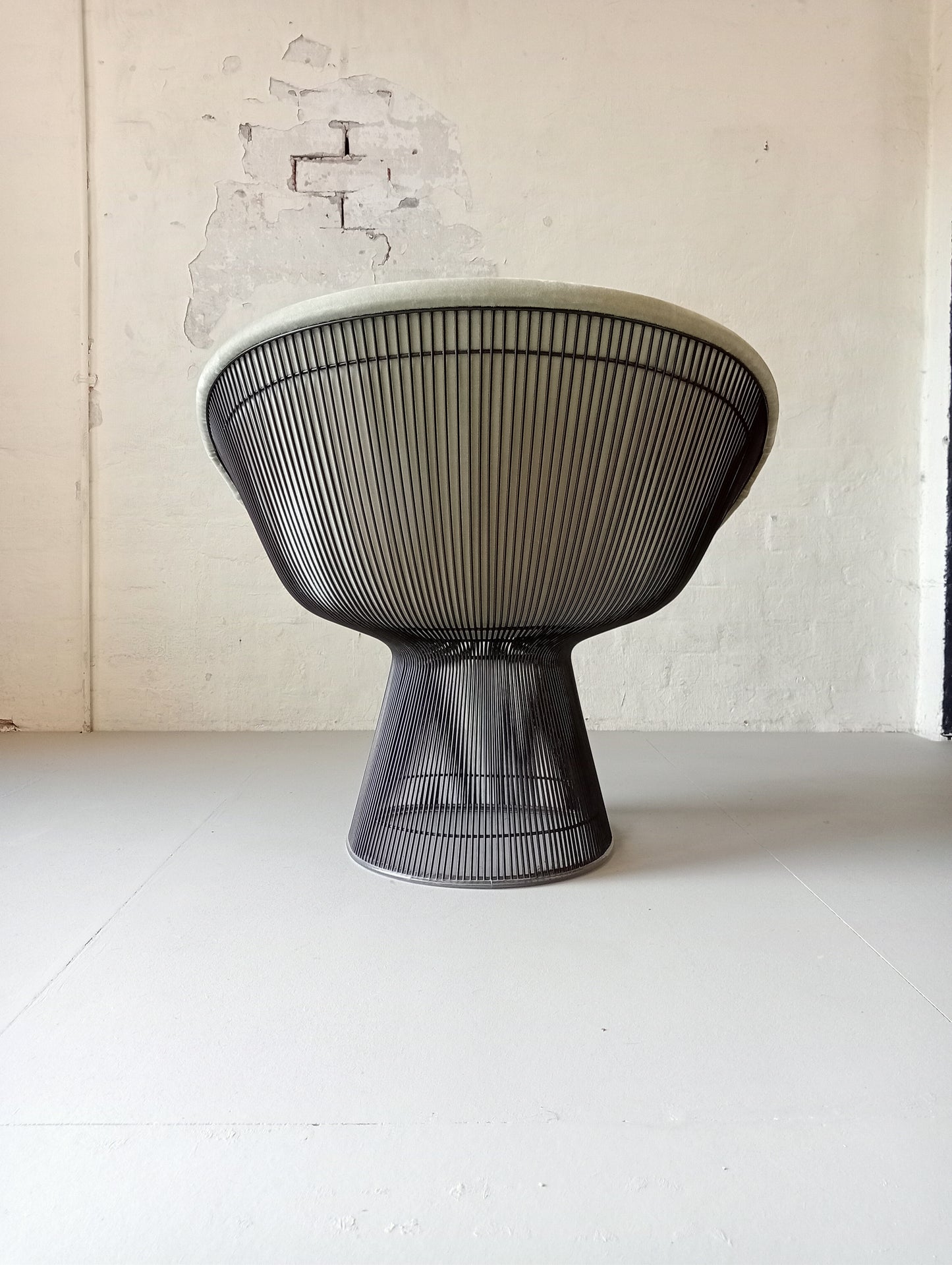 Warren Platner for Knoll armchairs.