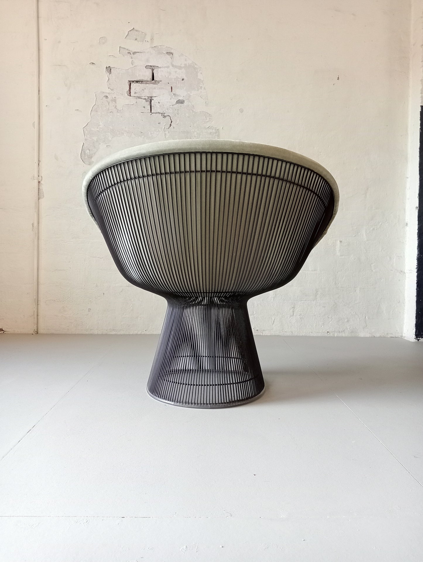 Warren Platner for Knoll armchairs.