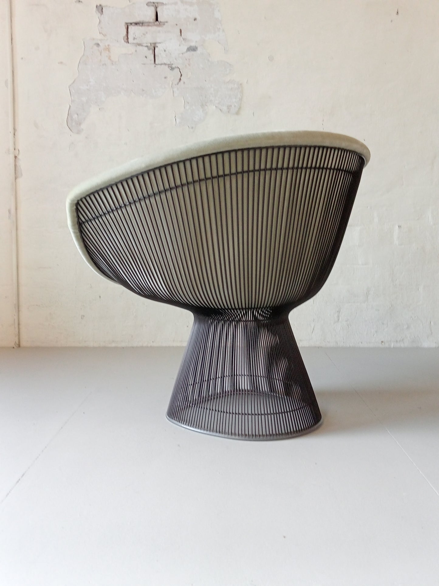 Warren Platner for Knoll armchairs.