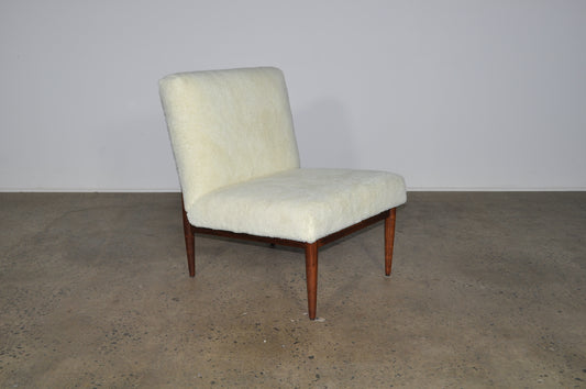 Blackwood lounge chair with sheepskin.
