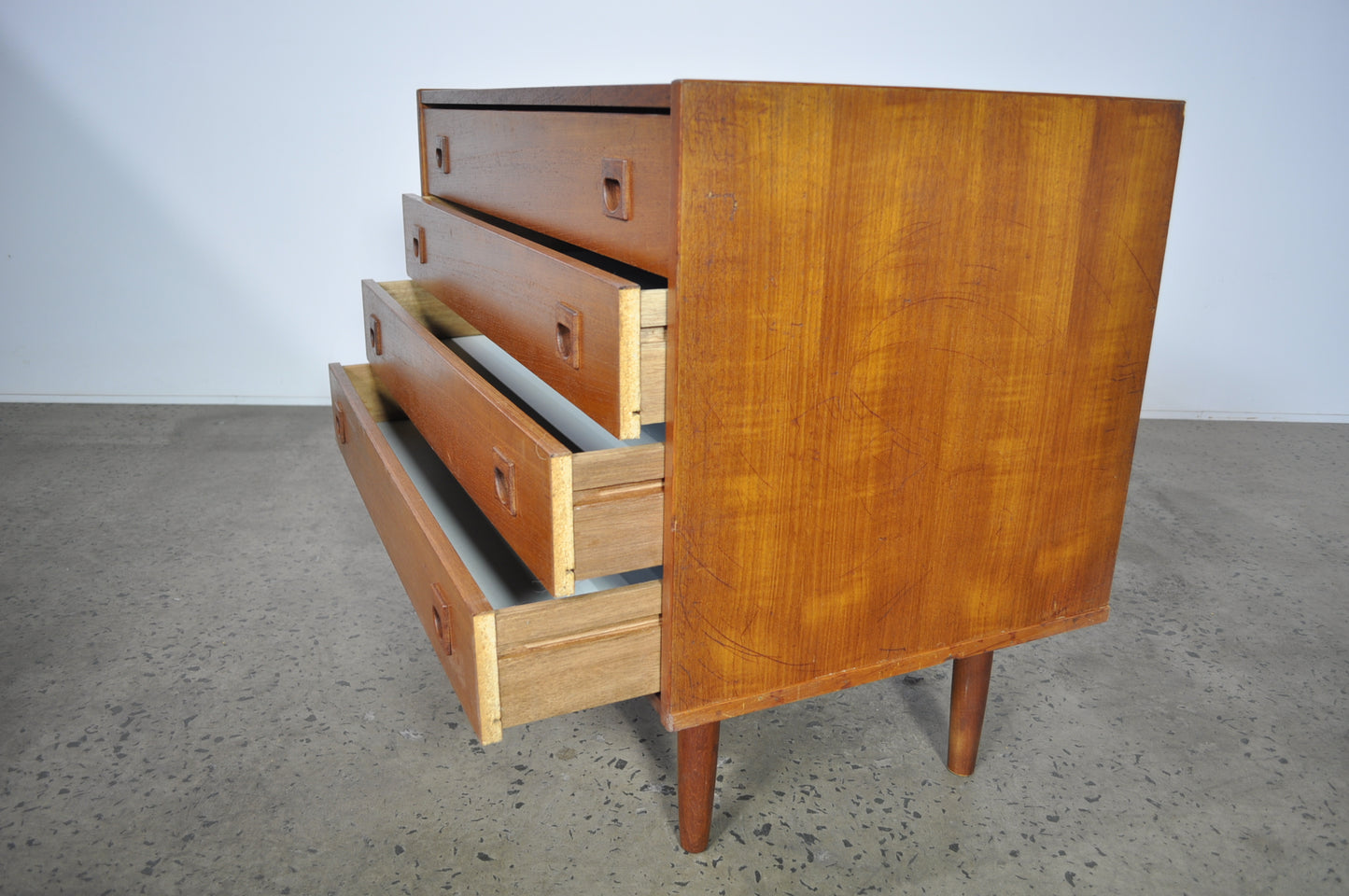Teak storage unit with drawers.