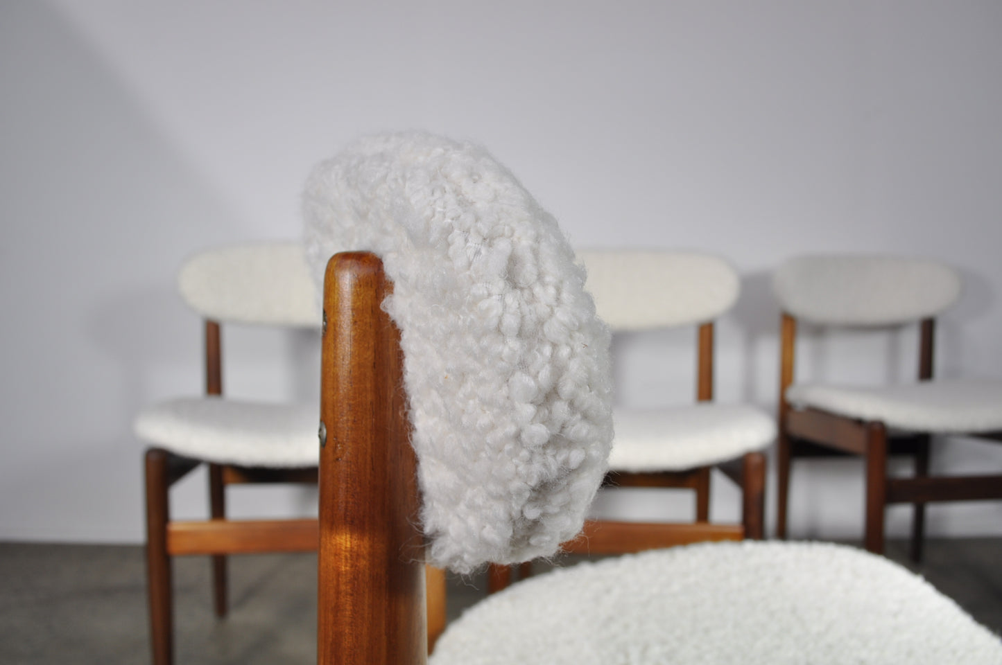 Elite Dining chairs in shearling fabric.