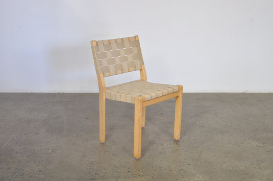 Alvar Aalto dining chairs by Artek in natural Danish webbing.